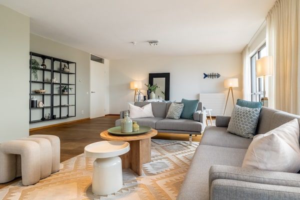 Woonkamer - Luxe appartement met uitzicht in Den Haag (2)