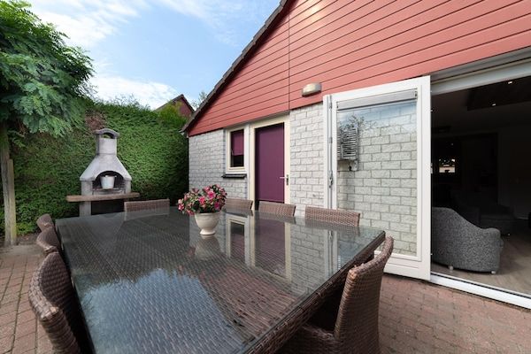 Terras - Heerlijk vakantiehuis met bubbelbad in Wemeldinge (5)