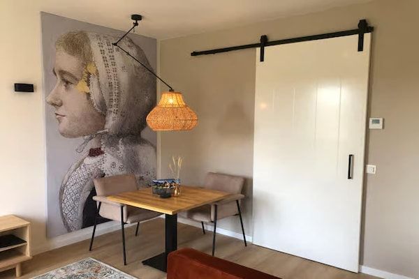 Eetkamer - Lodge met prachtig uitzicht op de tuin in Zoutelande (3)