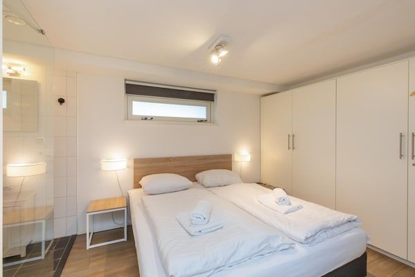 Slaapkamer - Modern vakantiehuis aan het strand voor 6 personen in Renesse (4)