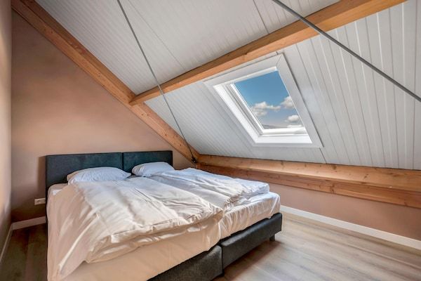 Slaapkamer - Prachtige nieuwe groepswoning met panoramisch uitzicht in Montfoort (4)