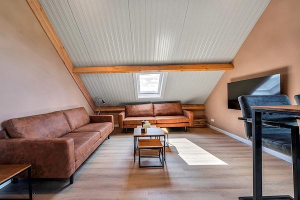 Woonkamer - Prachtige nieuwe groepswoning met panoramisch uitzicht in Montfoort (2)