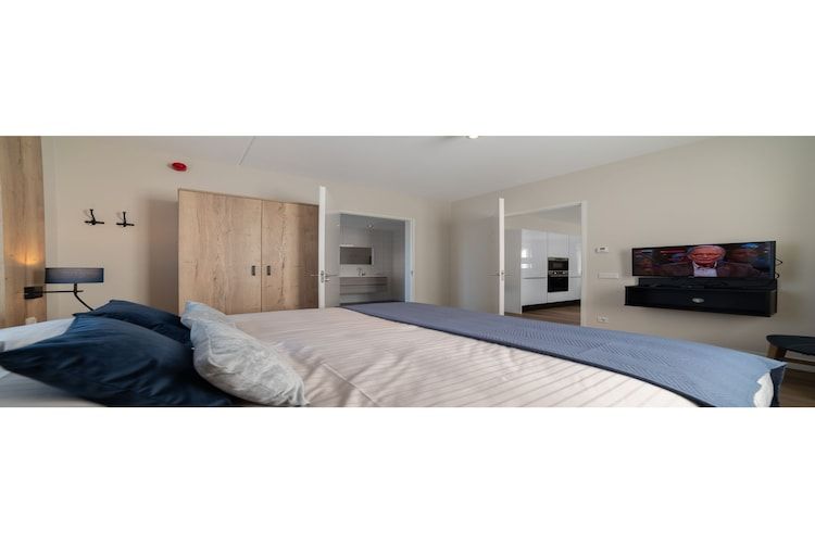 Een slaapkamer van Zeeuwse Parel luxe Appartement 4 pers 2 bdk in Colijnsplaat