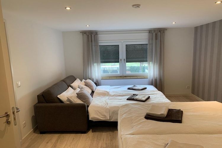 Een slaapkamer van Villa Grenszicht in Megchelen